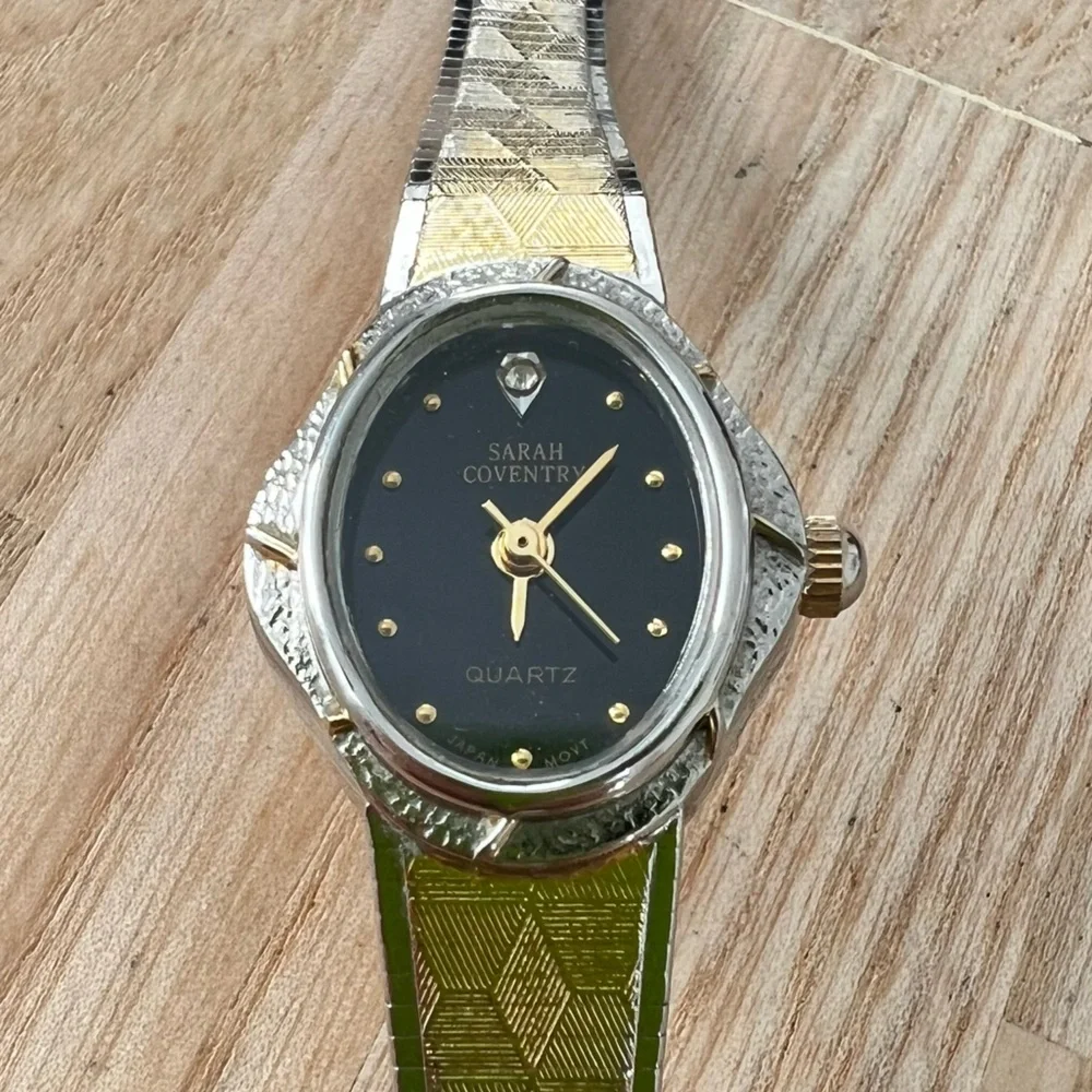 Sarah Coventry ladies black dial oval two tone dress watch NEW BATTERY